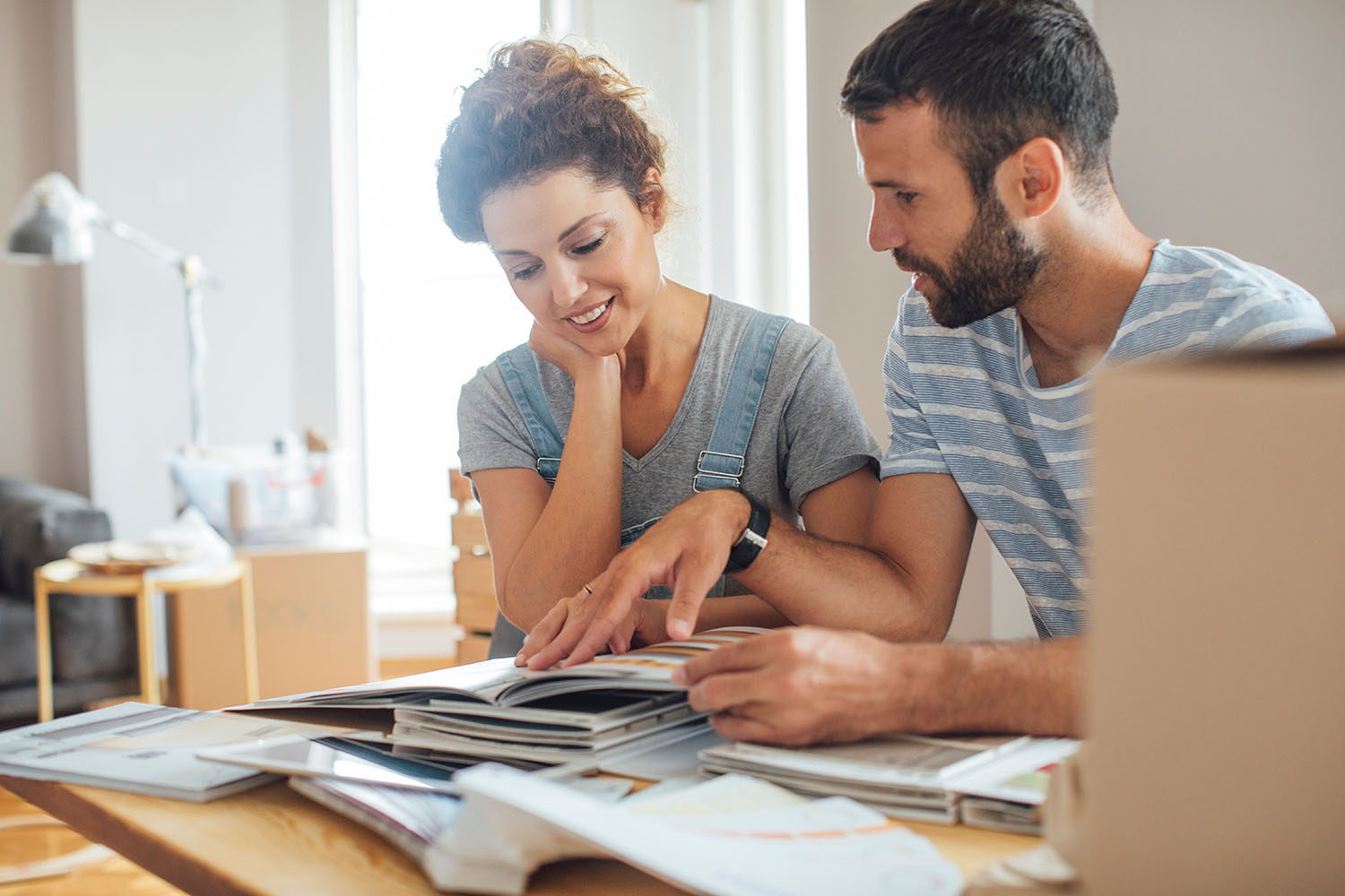 Husband and wife planning interior design.