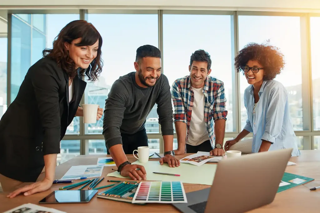 Man discussing new designs and color scheme with colleagues