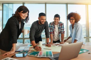 Man discussing new designs and color scheme with colleagues